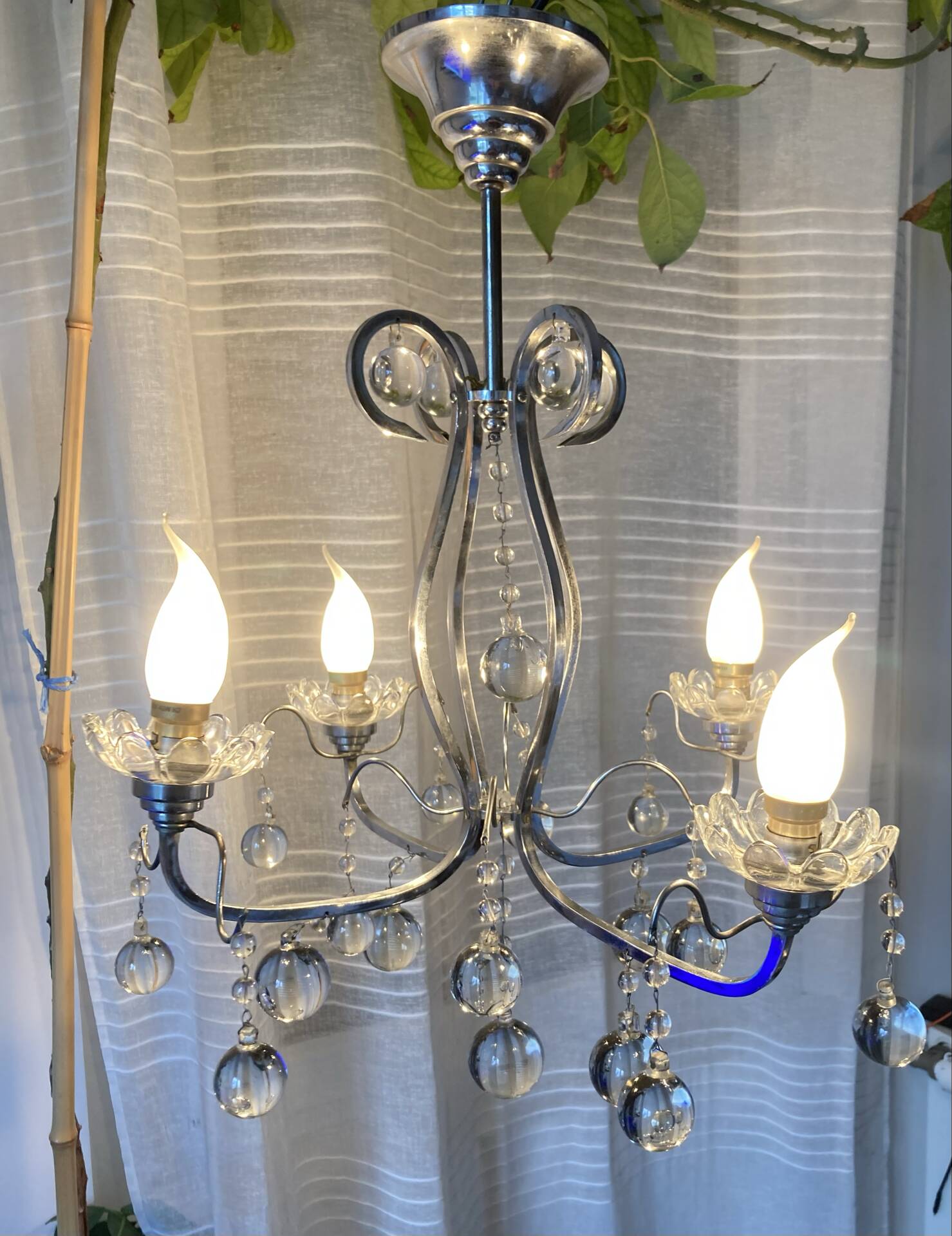 Art Deco chandelier from the early 20th century in chrome brass, with glass pendants.