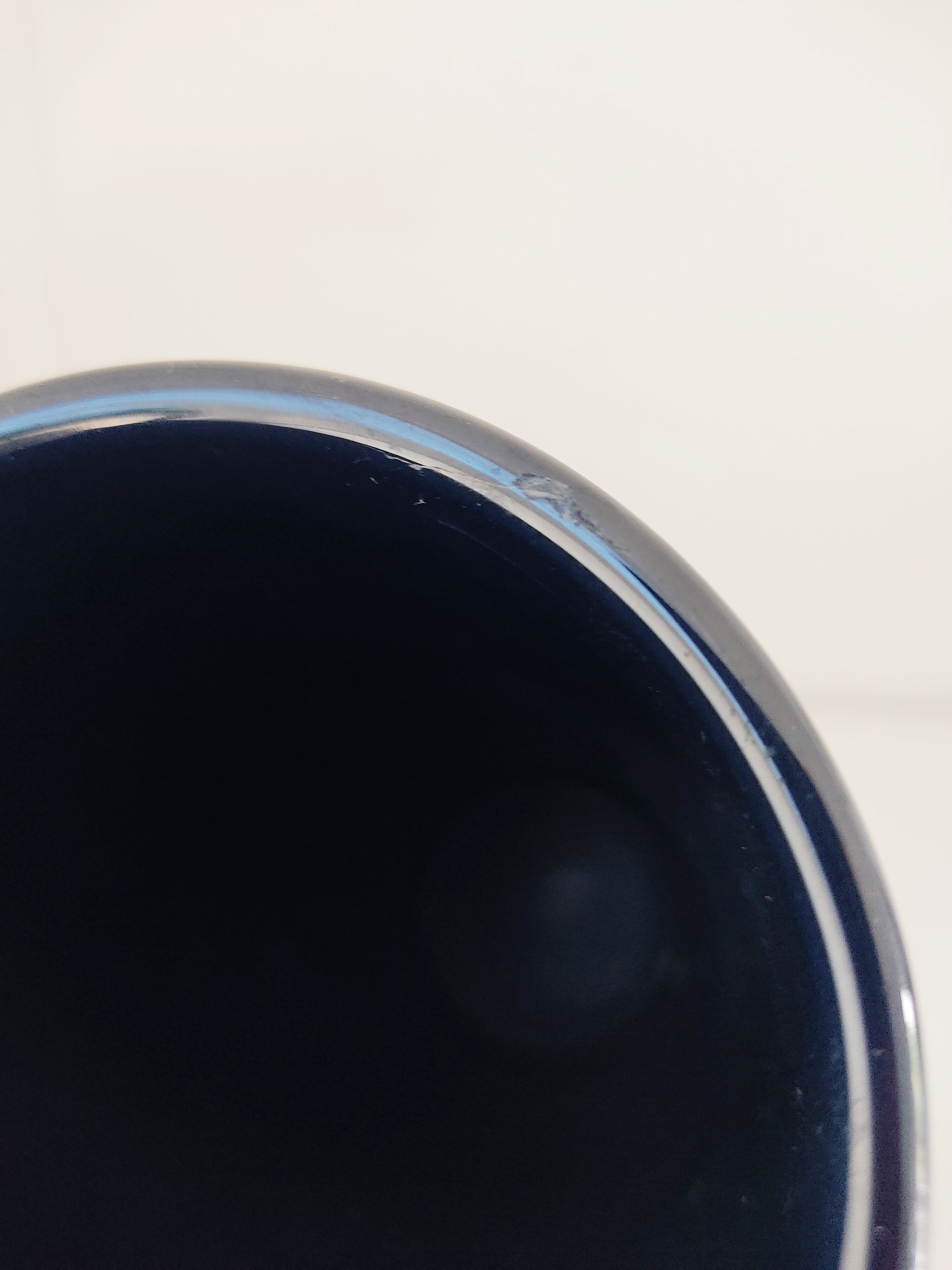 Dark blue ceramic roller vase