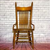 Wooden armchair with high back