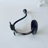 Ancient metal patère