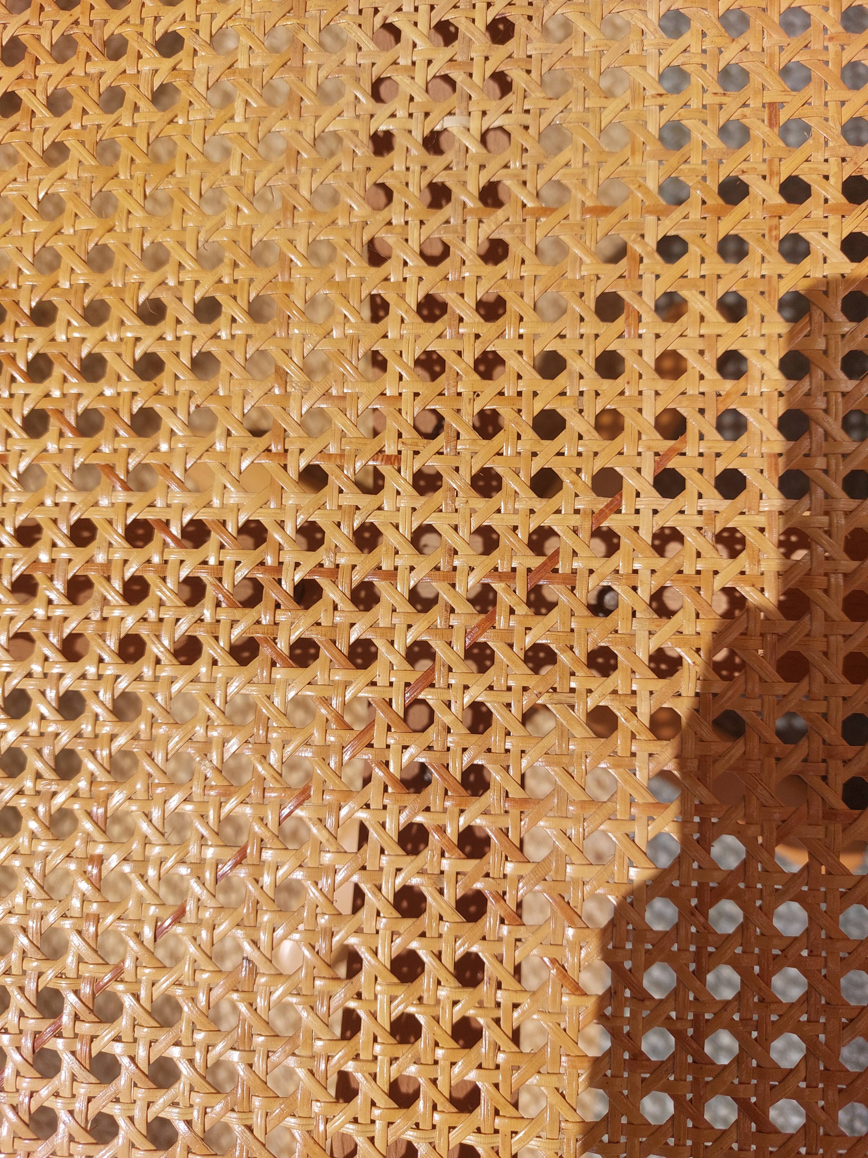 swivel armchair in wood and cane