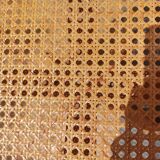 swivel armchair in wood and cane