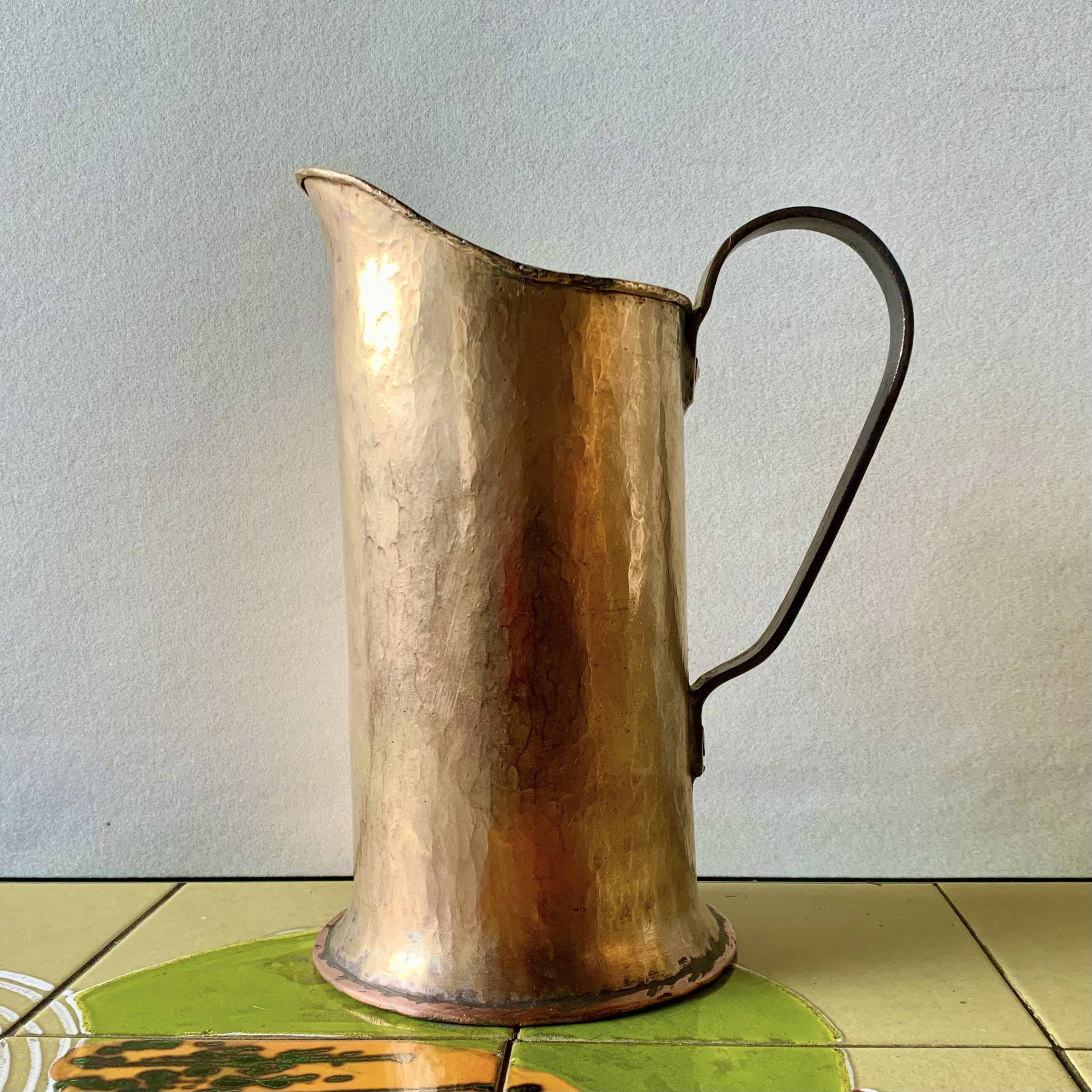 Old hammered copper water jug - artisanal work