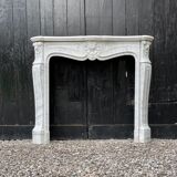 Louis XV style fireplace in Carrara marble