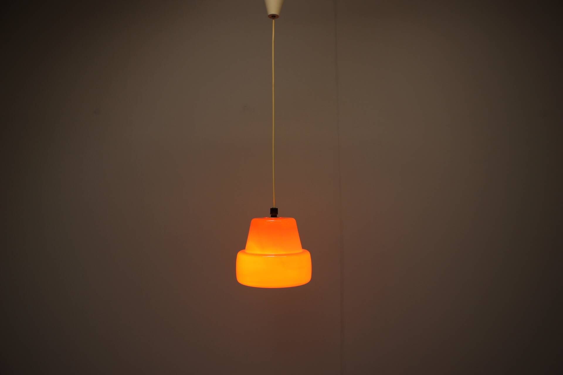 Vintage orange glass pendant lamp, Czechoslovakia, circa 1970.