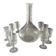 Service of an engraved art deco liqueur - captain's decanter and 9 matching glasses.