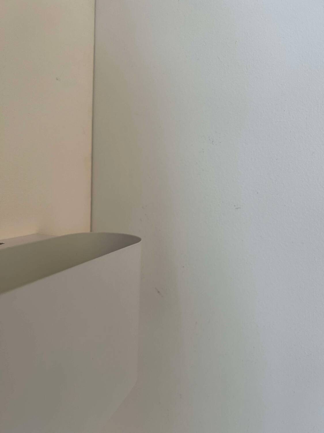 Pair of vintage wall lights, curved white metal, France 1980