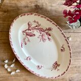 Old oval dish in iron earth