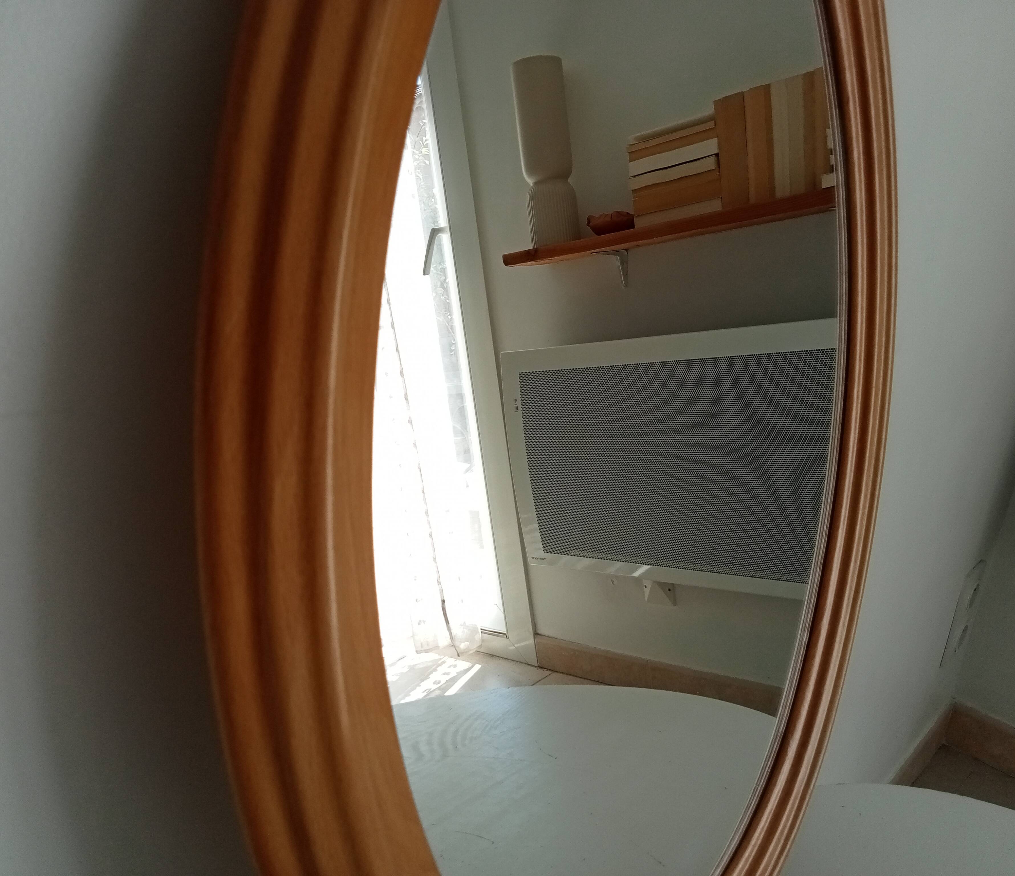 Vintage oval mirror in beech from the 70s/80s.