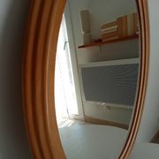 Vintage oval mirror in beech from the 70s/80s.