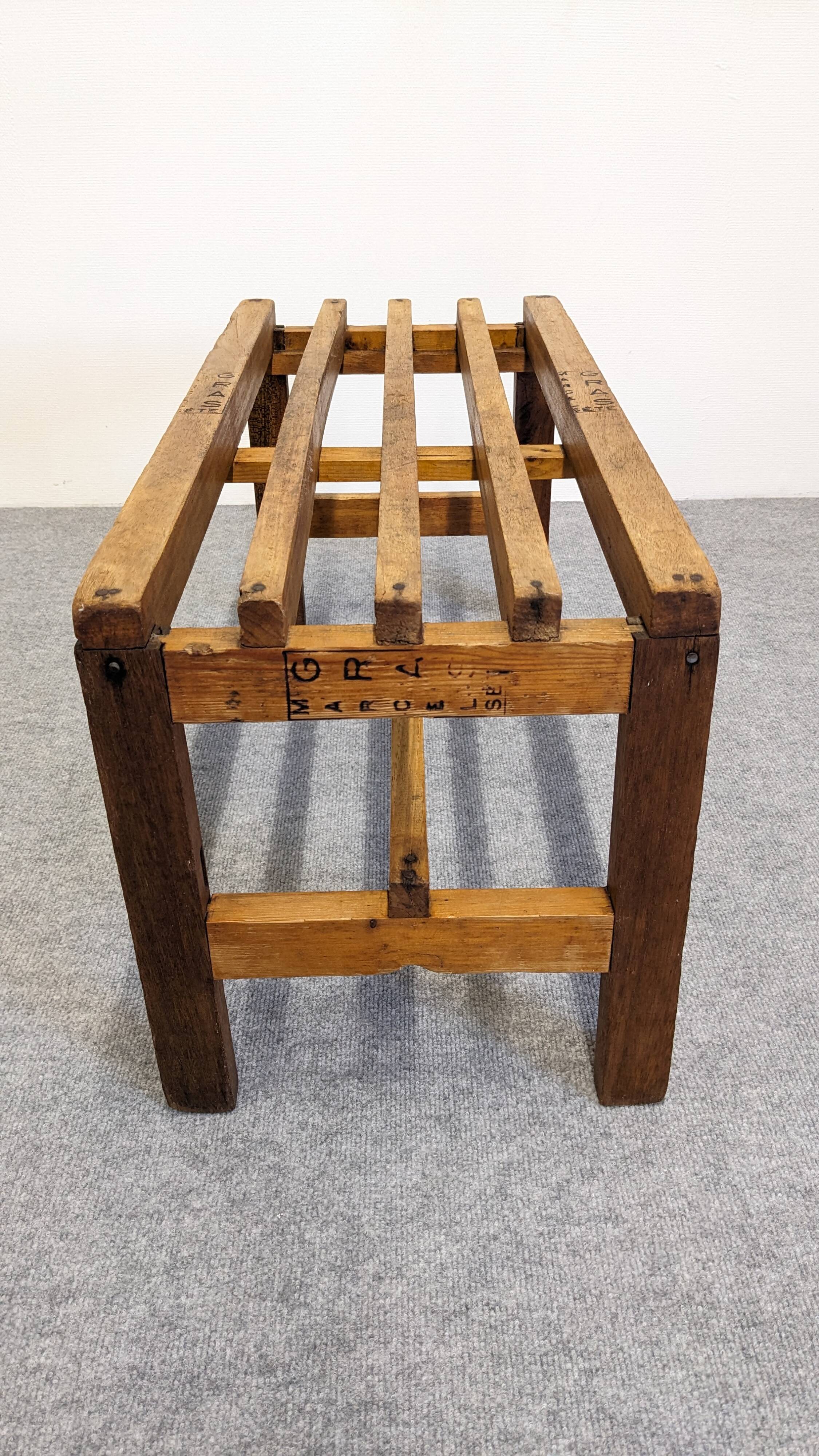 Wooden slatted display bench or support, France circa 1960.