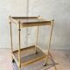 Gilded brass table and glass
