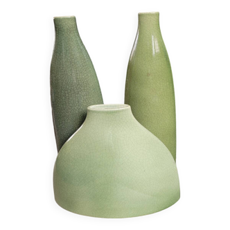 Trio of green enamelled vases