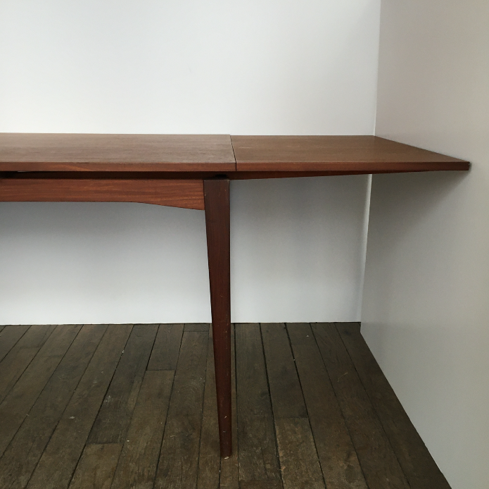 Teak dining table with extensions
