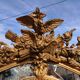 Large closed mirror, 19th century, wood and gilded stucco.