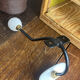 Metal and porcelain hook