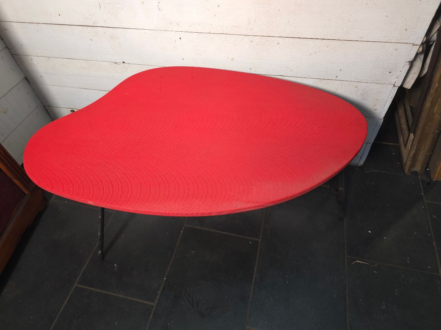 Vintage coffee table from the 1960s in red.