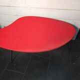 Vintage coffee table from the 1960s in red.