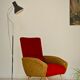 Red and mustard yellow fabric armchair in 1970s style