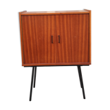 Piece of furniture on high compass feet