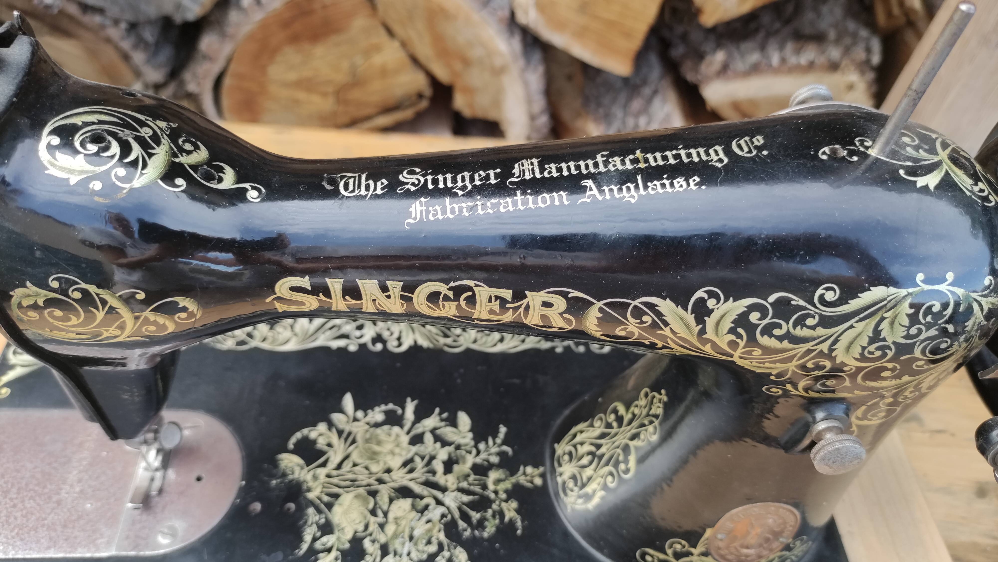 Old Singer sewing machine on pedestal