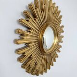 Ancien miroir soleil doré œil de sorcière bombé en résine, années 70