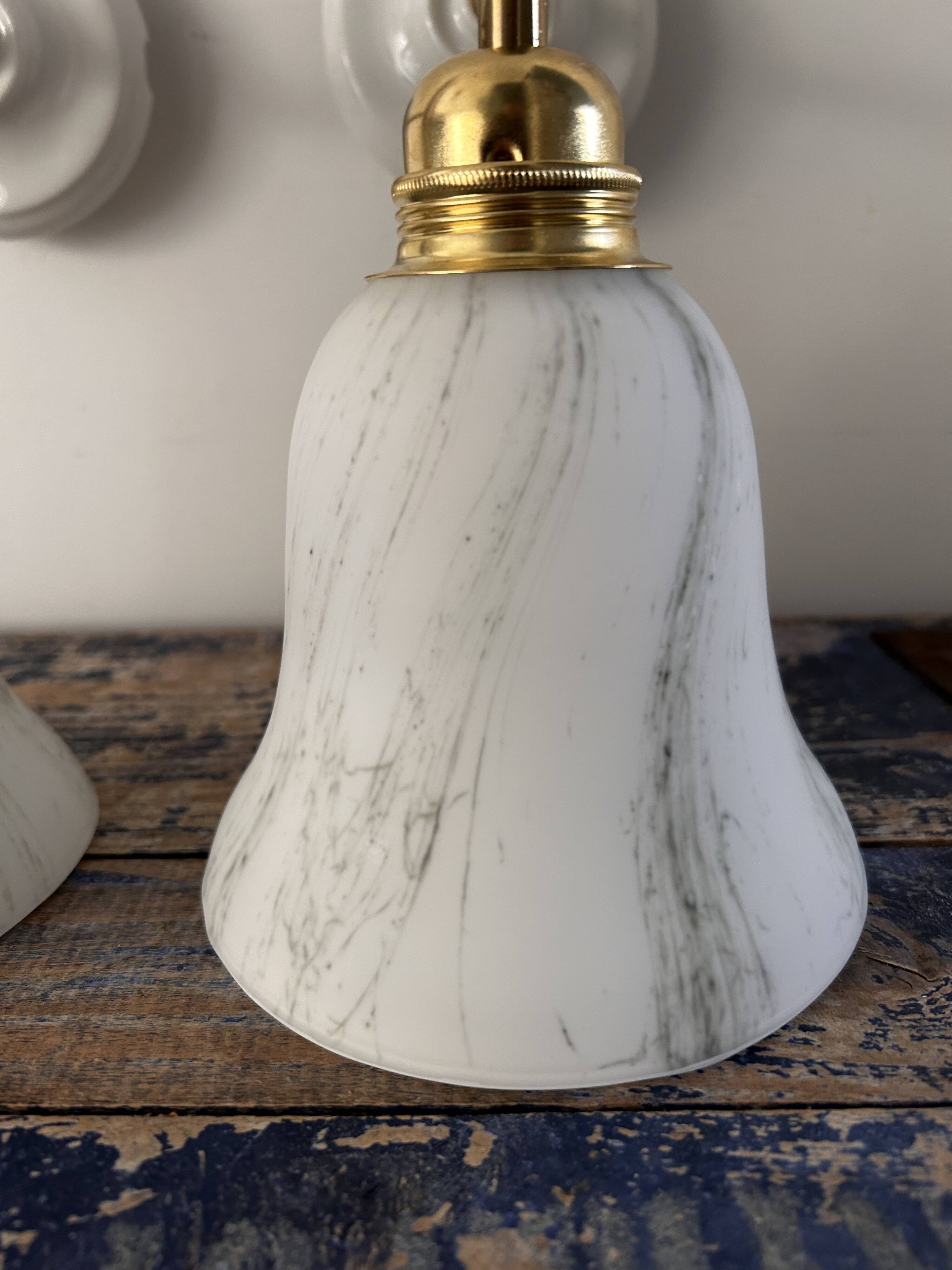 Pair of brass and opaline wall lights
