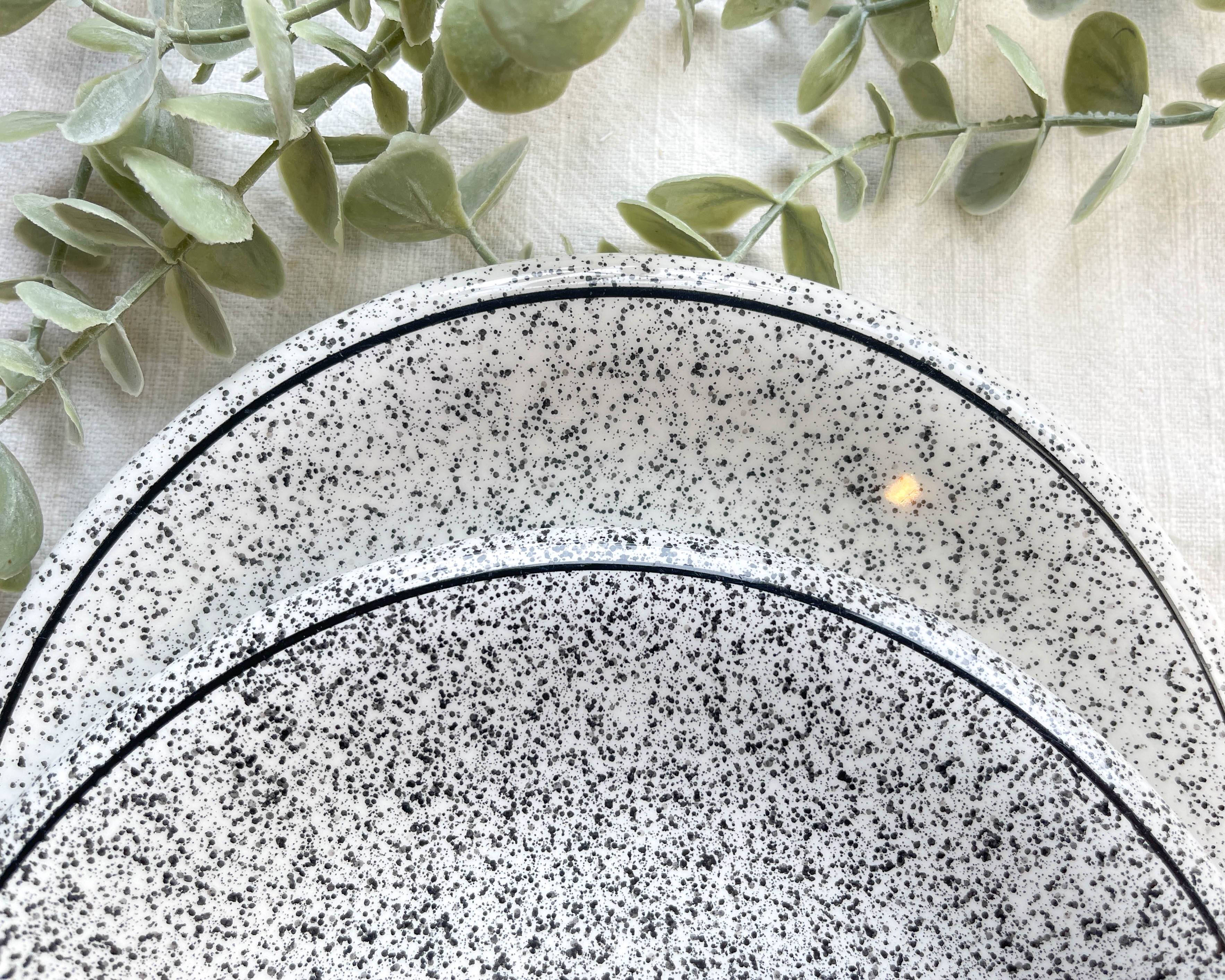 2 Small vintage plates in black and white speckled Italian earthenware