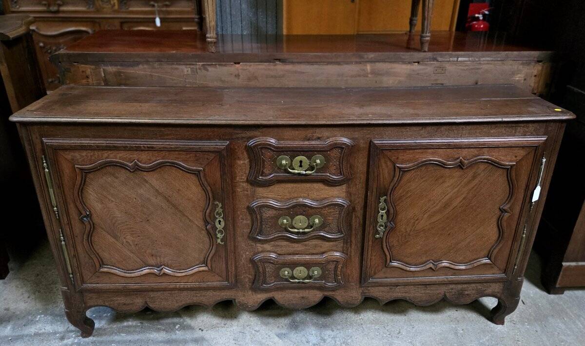 Louis XV oak buffet in enfilade style.