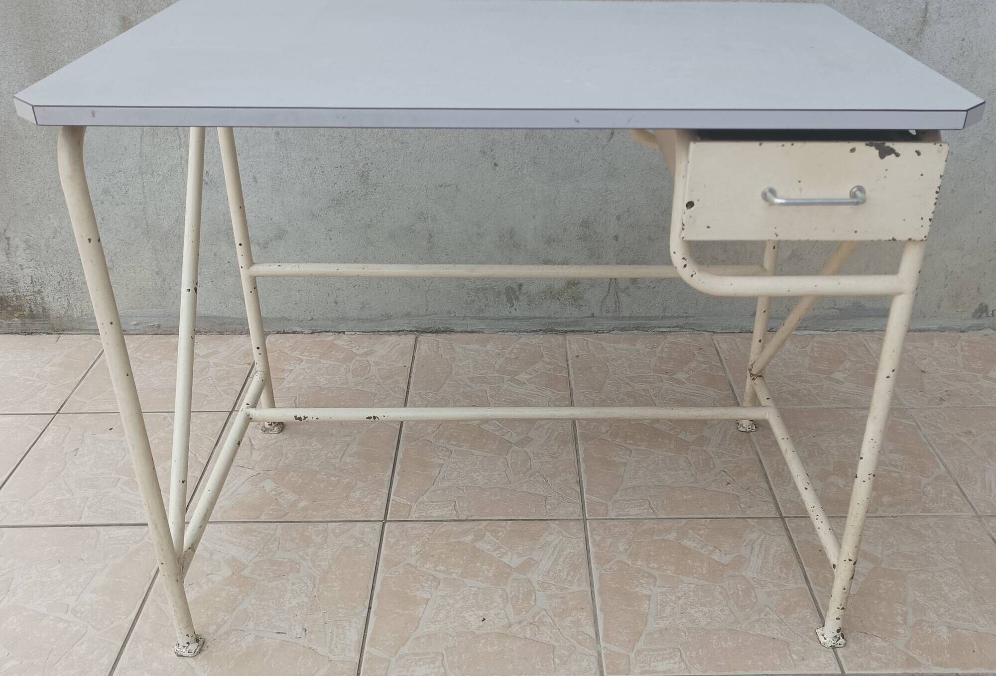 Industrial high table made of metal and formica.