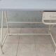 Industrial high table made of metal and formica.