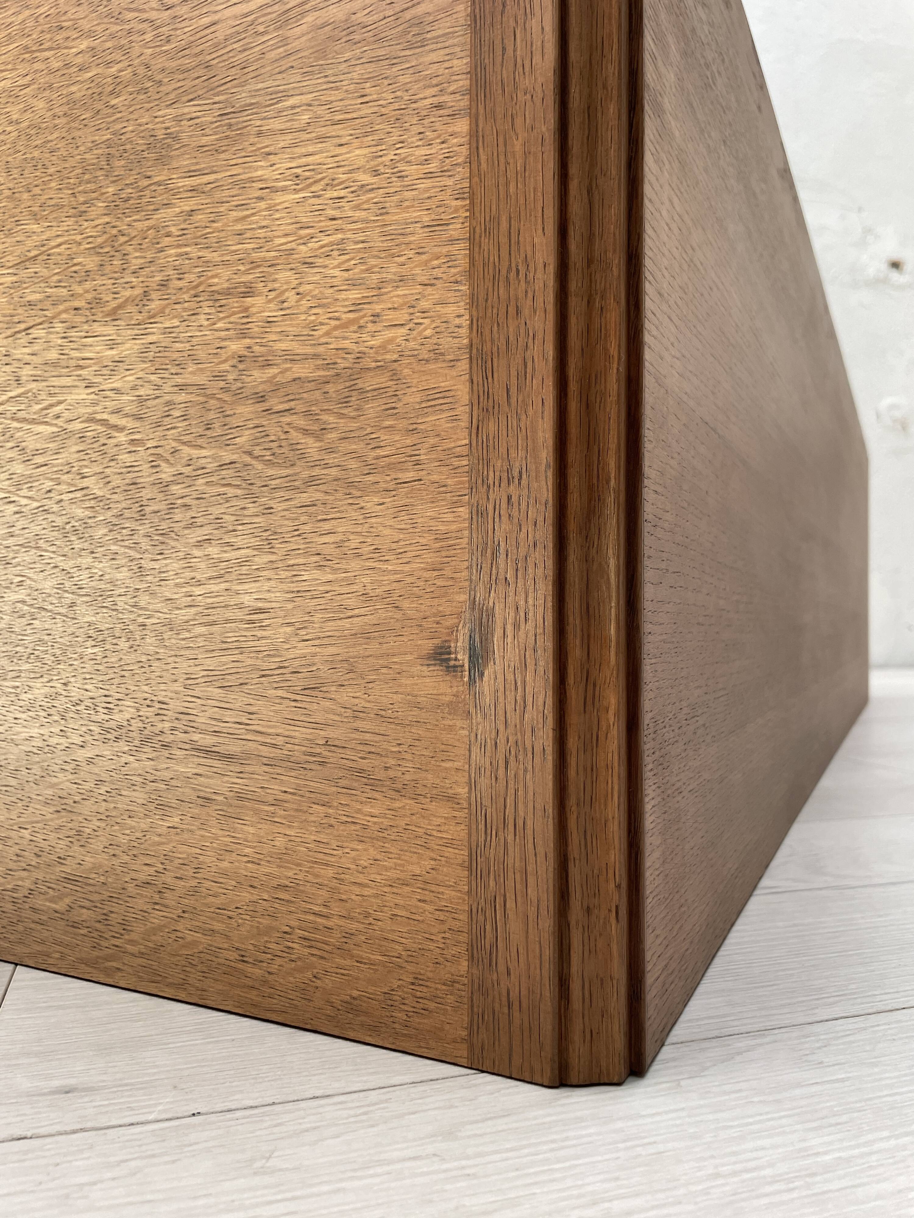 Storage unit in solid oak and veneer, circa 1960.