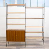 Shelf on feet, black metal ladders, 60s