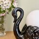 Vintage lamp, black ceramic swan and white opaline globe