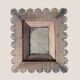 Antique mirror in gilded wood