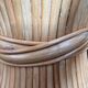 Table basse ronde gerbe de blé en rotin par John McGuire