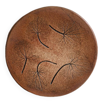 Sandstone trivet, signed