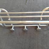 Old aluminum coat holder with 5 pads and a hat holder. Year 50