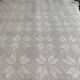 White cotton bedspread, crocheted sofa throw with star patterns