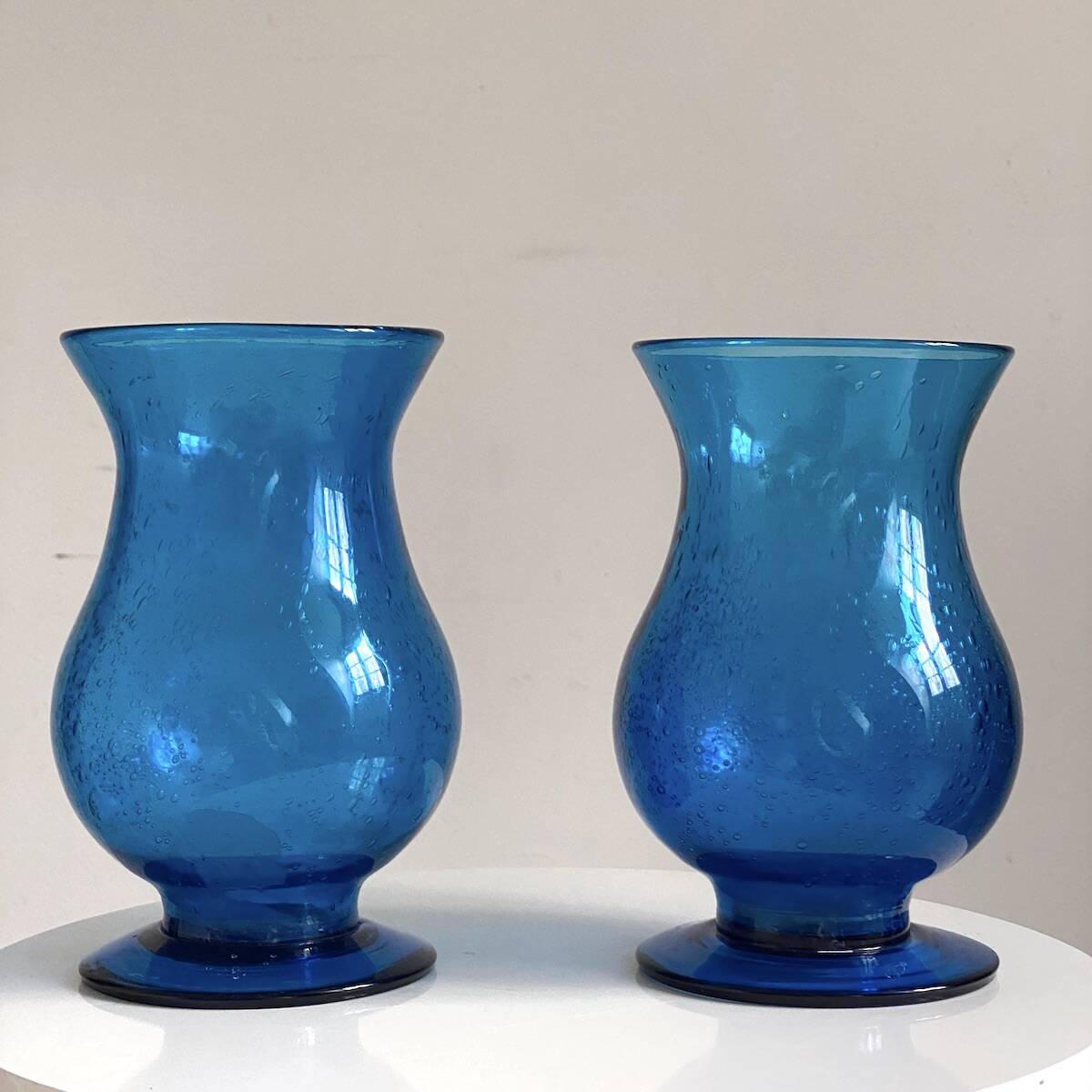 Pair of candle holders from the Biot glassworks, height 22 cm, diameter 15 cm.