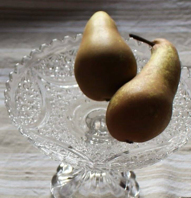 Cut glass goblet with a transparent stem.