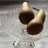 Cut glass goblet with a transparent stem.