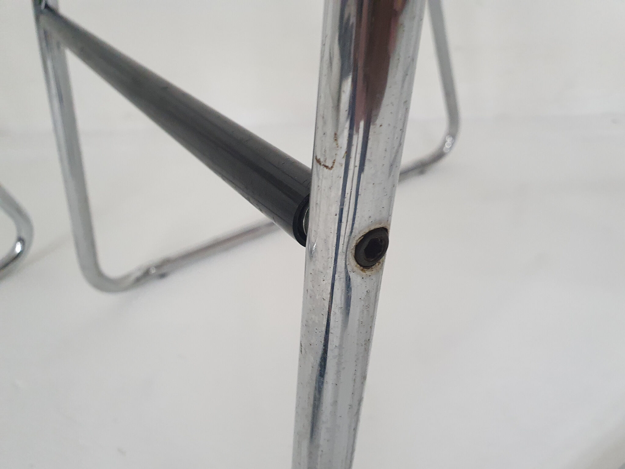 Set of four chrome and cane bar stools, 1970's