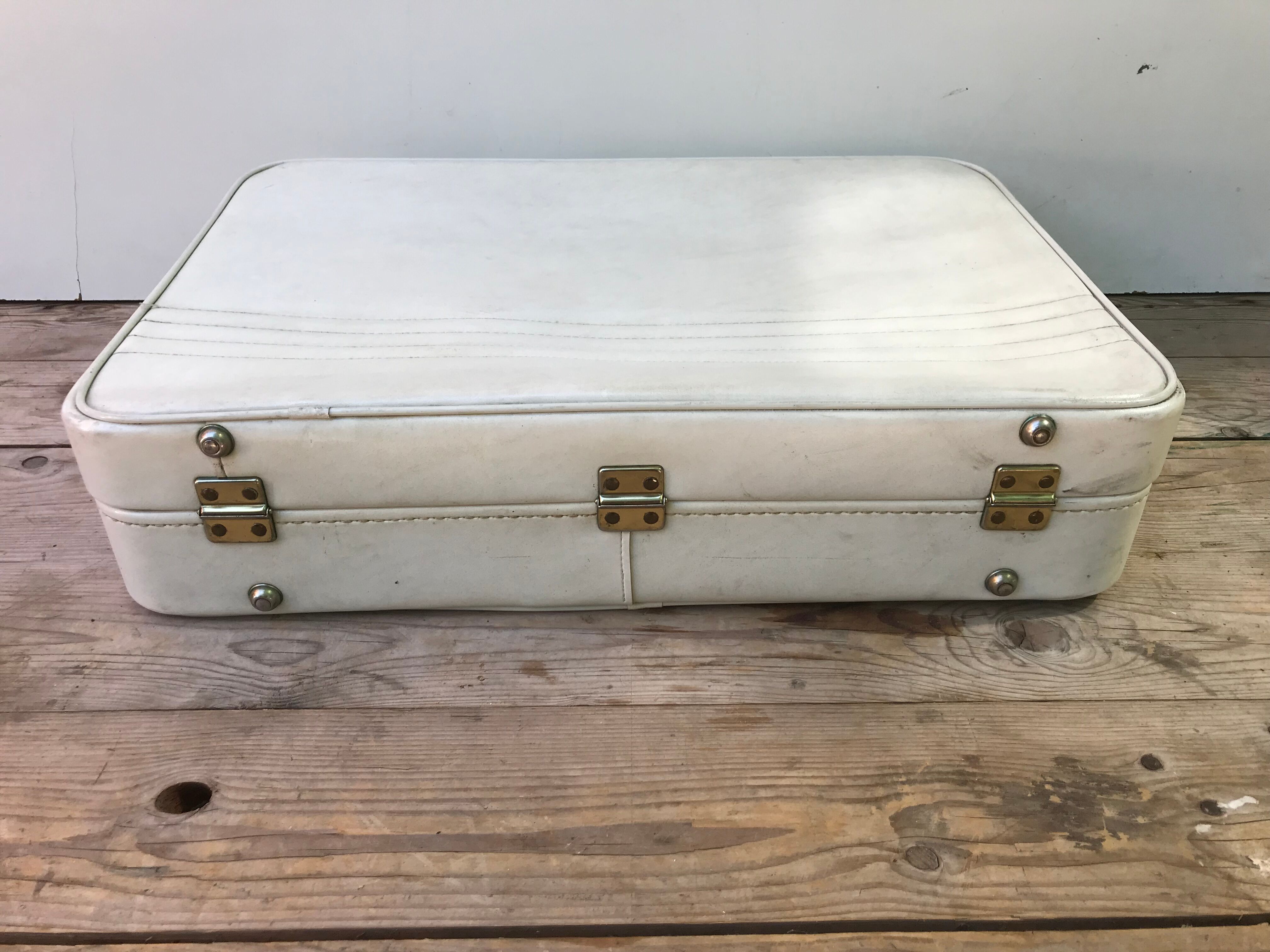 Old white leather case with vintage 70s leather handle