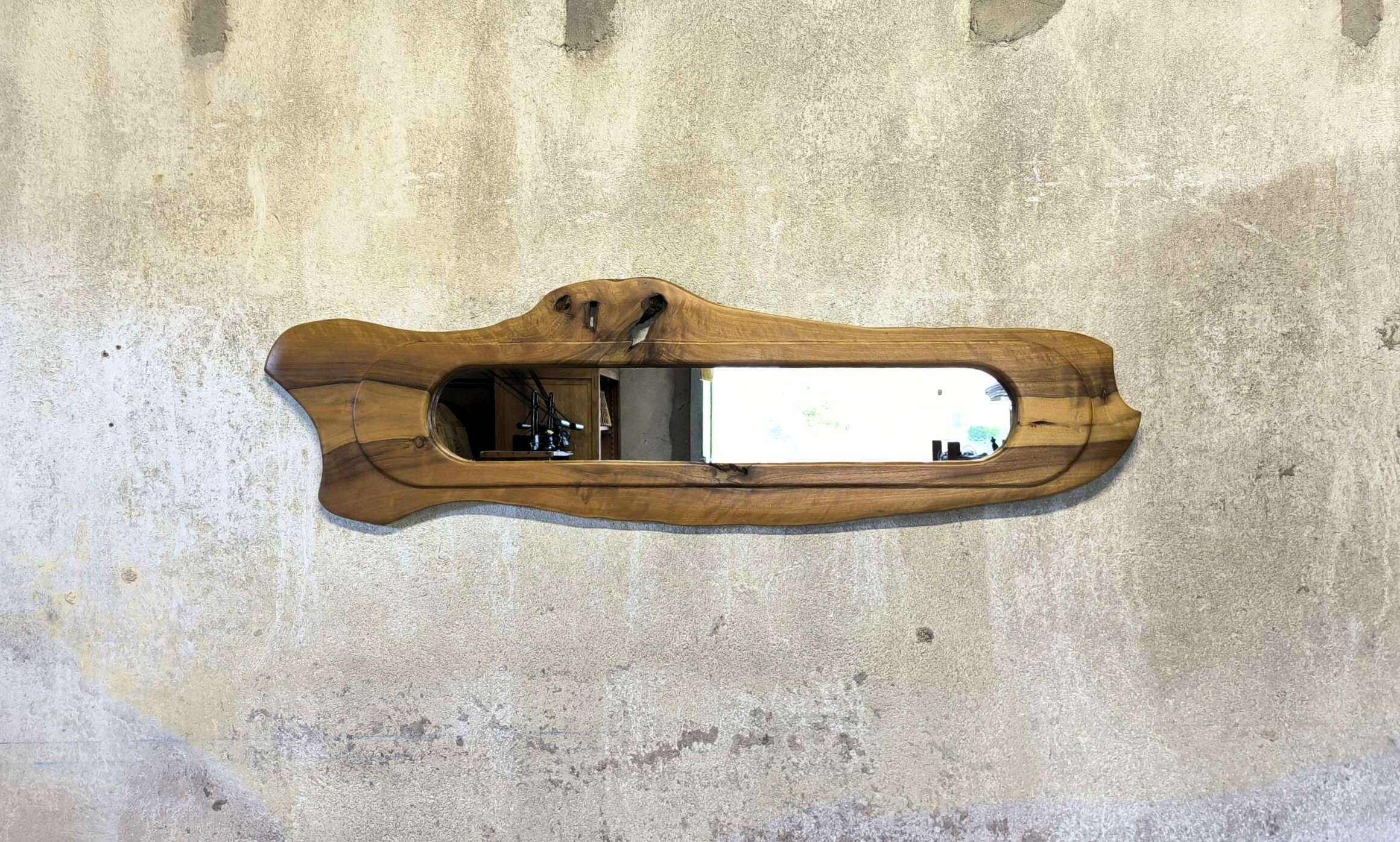 Vintage free-form mirror in solid wood.