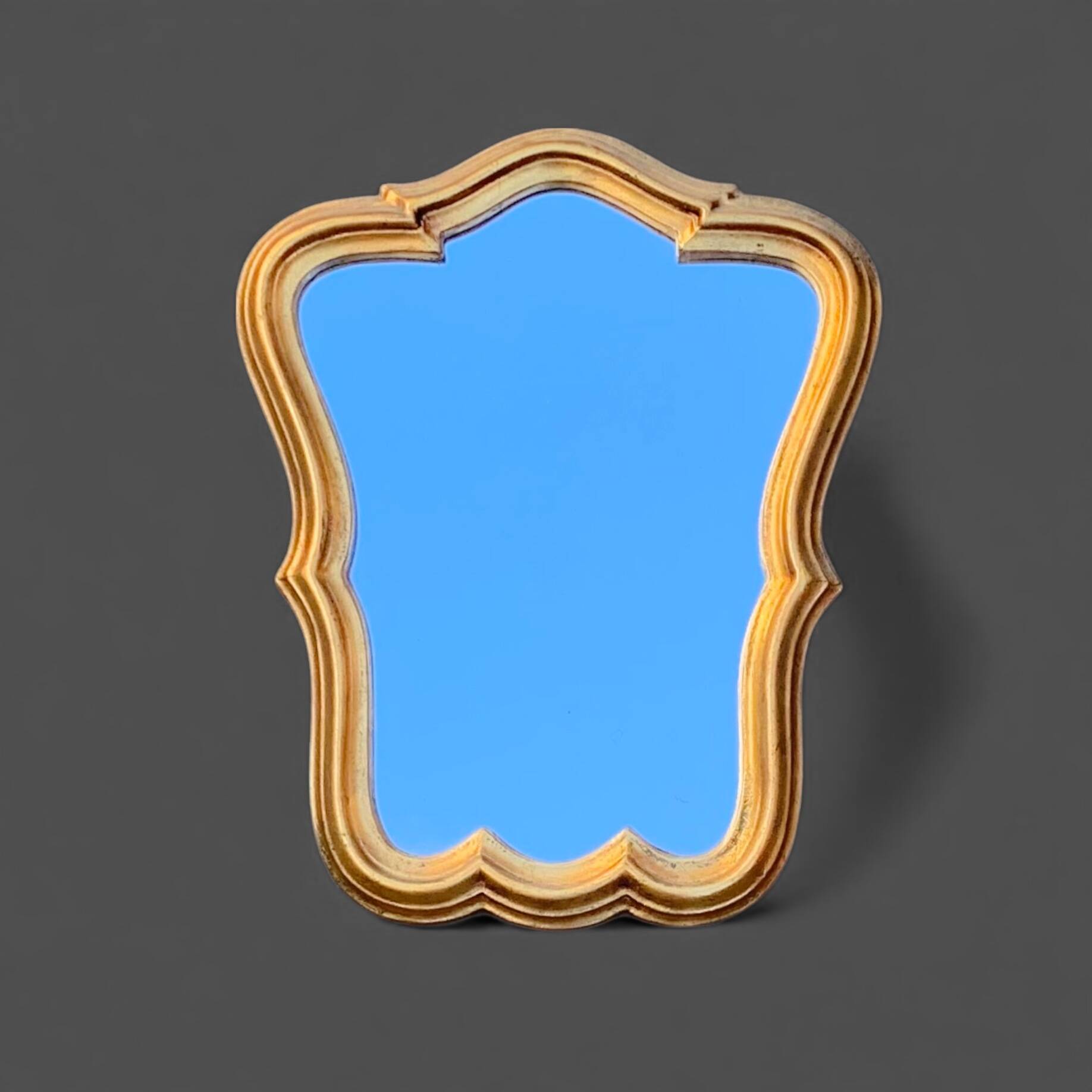 Miroir mural vintage en résine dorée