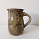Old pitcher in pyrite stoneware