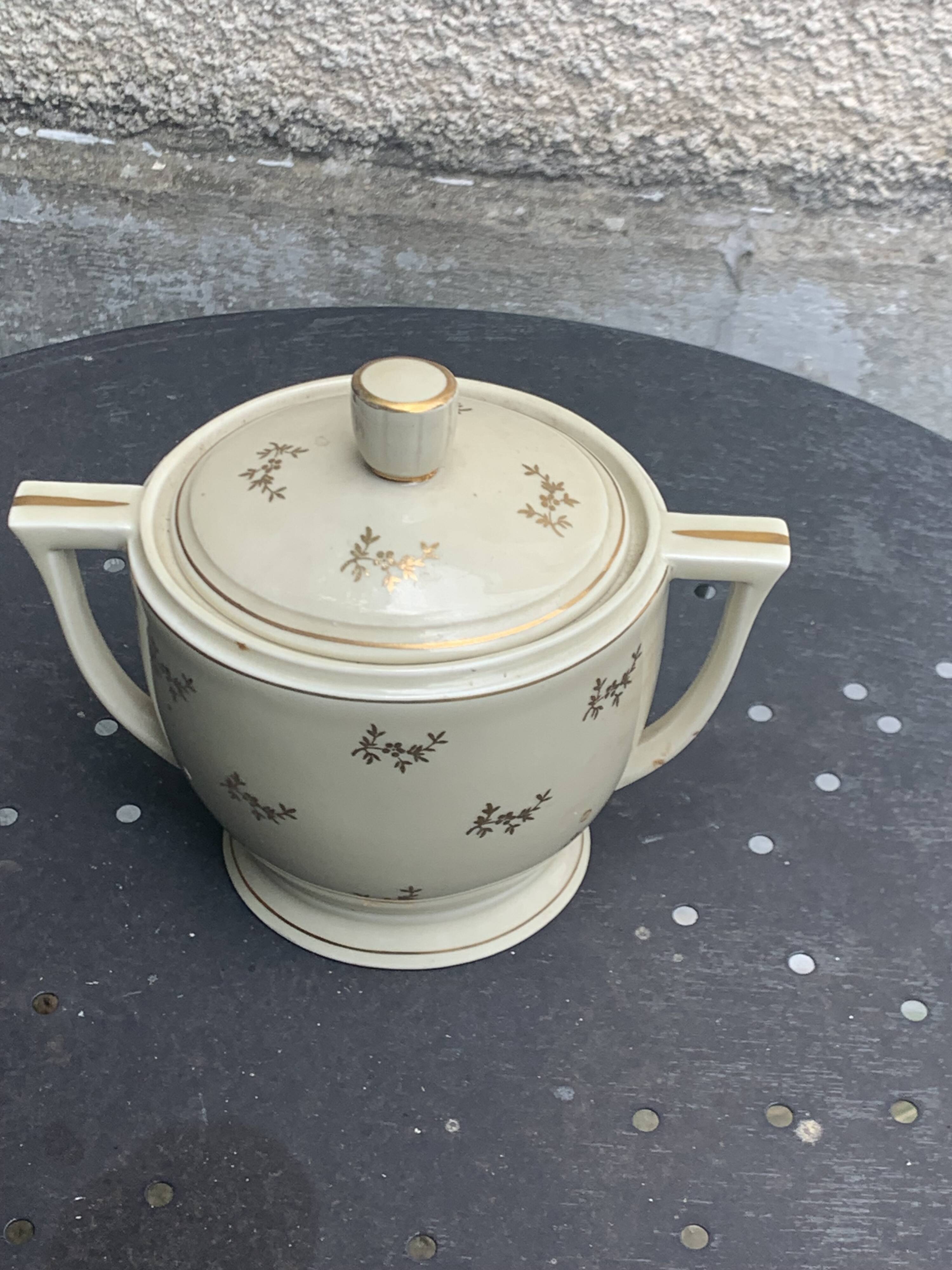 Antique porcelain sugar bowl and milk jug from the Royal Factory of Limoges, France