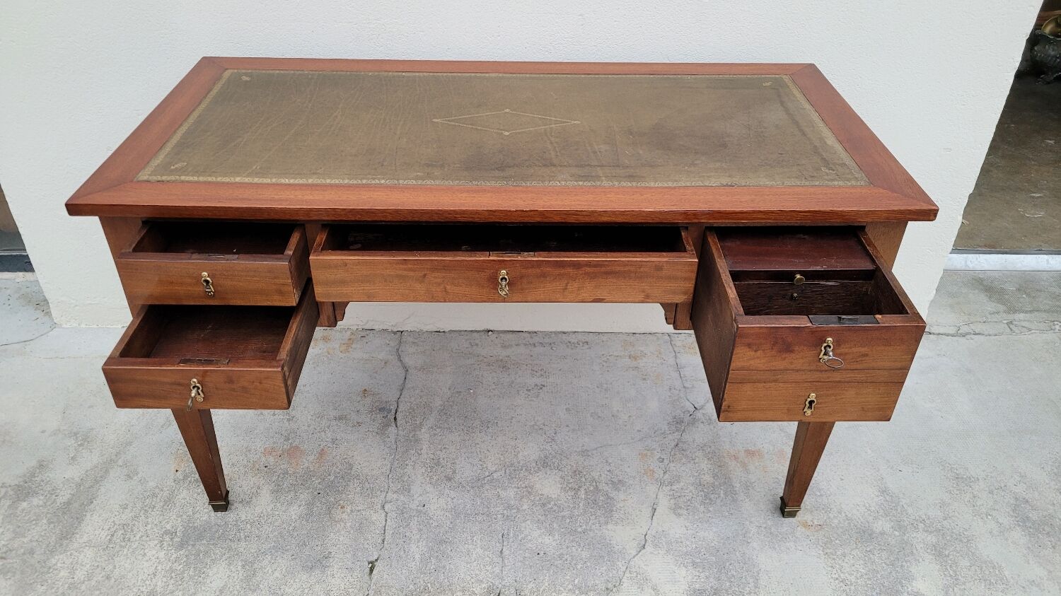 Louis XVI style flat desk in 19th century mahogany