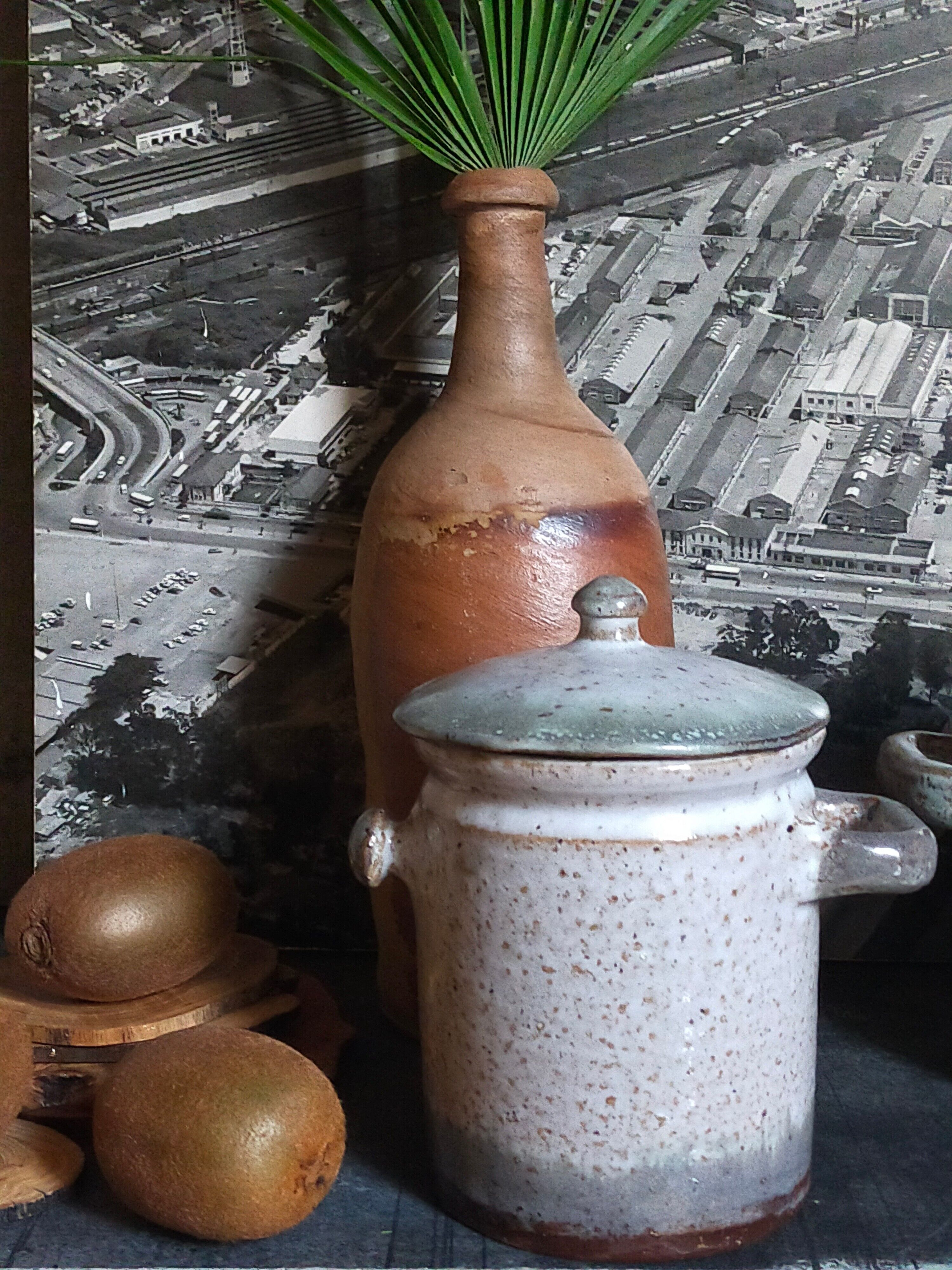 Duo of potter's pots covered in vintage glazed stoneware
